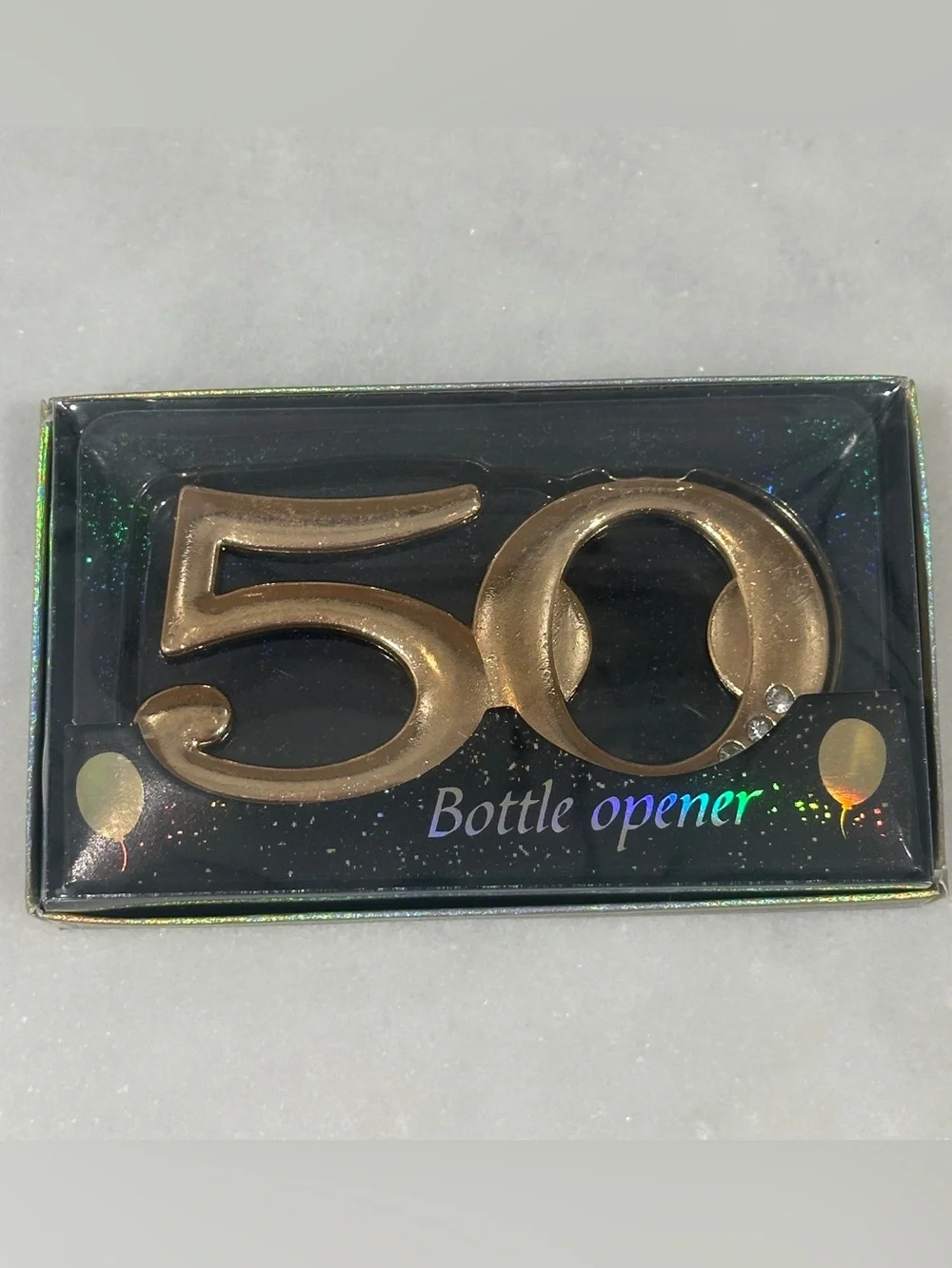 50th Celebration Gold Bottle Opener giveaway to guests